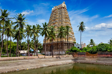 Gopura (tower) and temple tank of Lord Bhakthavatsaleswarar Temple. Built by Pallava kings in 6th...