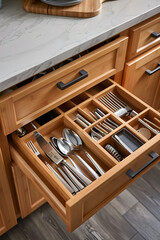 Fototapeta na wymiar Aesthetic and Practical Wooden Utensil Drawer Organizer Perfect for an Organized Kitchen