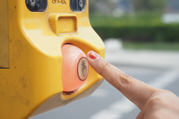 close up of crossing signal button 