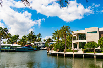 Enjoying summer vacation on boat in the sea with villa. Summer vacation with a speed boat yacht. Summer vacation. Yacht boat. Summer holidays on luxury yacht. Summertime retreat