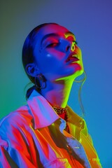 Neon Lighting's Dramatic Impact on Modern Fashion in a Photo Shoot