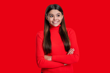 Stylish girl has long hair. Teen monochrome fashion style. Style for girl. Headshot portrait of happy teen girl isolated on red. Teen girl looking at camera. Casual style. Effortless cool