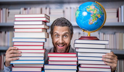 school literature education. nerd man in classroom. bookworm in school library. education and...