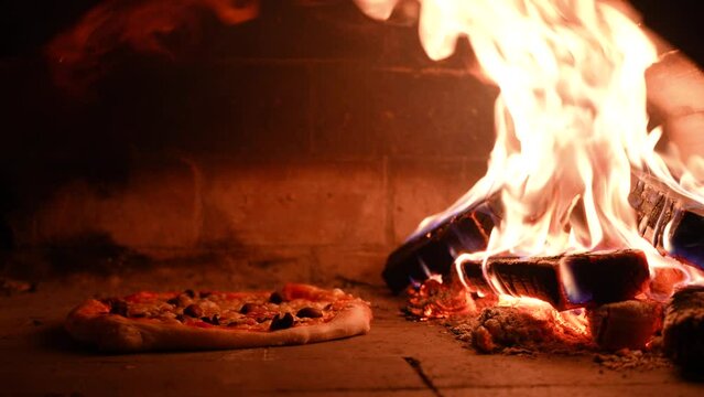 Wood fired pizza baked in a brick oven