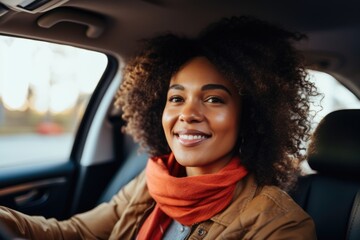 Elegant woman driving a car, exuding confidence and independence with a strong, focused gaze
