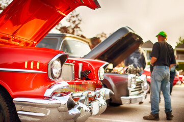 Collection of impressive vintage cars at public exhibition. 