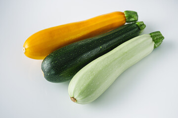 fresh natural zucchini on a white background