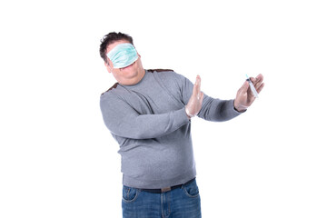 Taking care of your health and cold season. Funny fat man in a medical mask.