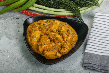 Spicy chicken masala in the bowl