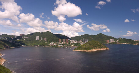 Scenic Tourist resort and hotels on Repulse Bay green hills in Hong Kong panoramic aerial view 