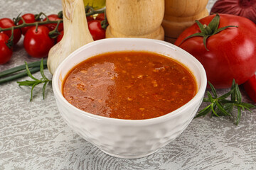 Hot tomato soup with diced chicken