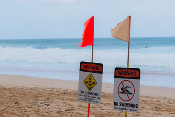 Warning signs at Pipeline Beach in Hawaii