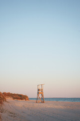 Lifeguard Tower in distance at an empty beach on Cape Cod