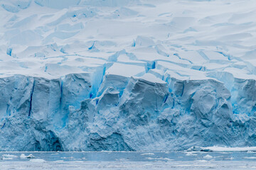 Close-up of the melting ice of a glacier wall on Danco Island, along the Antarctic Peninsula