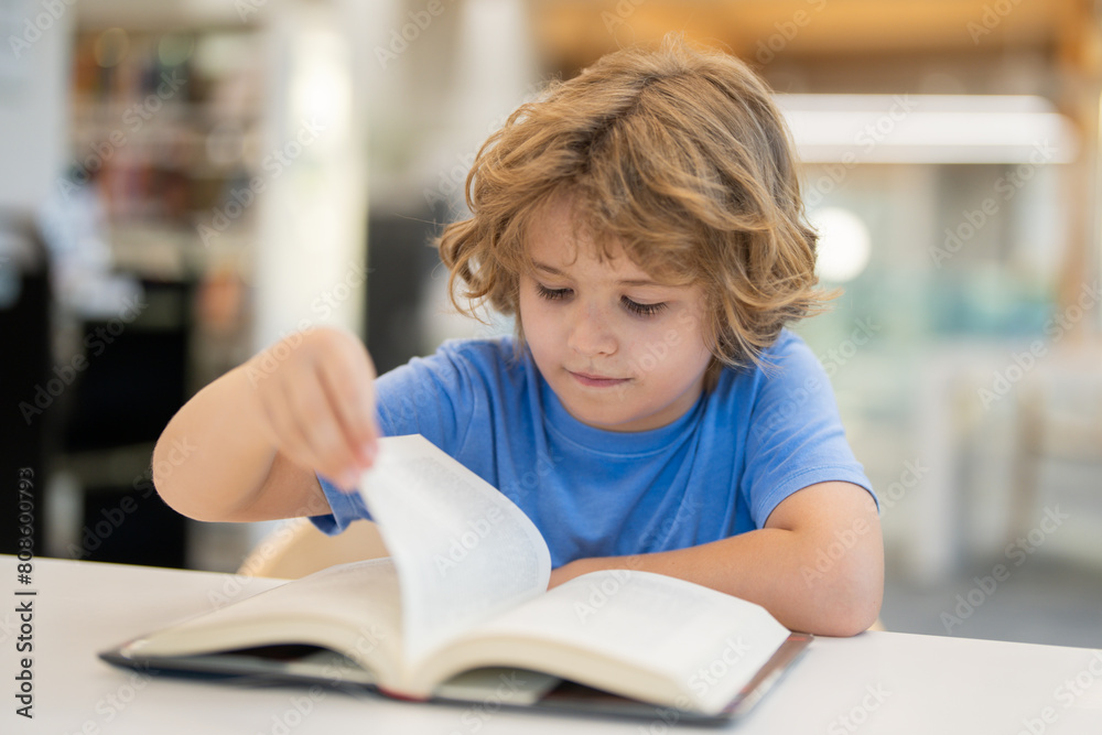 Poster kid reading book. child reading book in school library. learning from books. school education. back 
