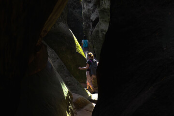 Two people in a rock maze, two people in a rock maze, outdoor activity, adrenaline sport, rock...