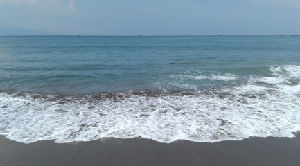 footprints on the beach. Nature tropical sea