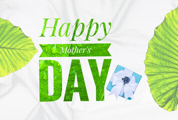 Happy Mother's day banner with gift box and green leaves on white fabric background, Mother's day greeting card background idea