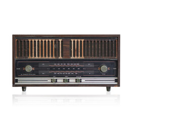 Fototapeta premium antique brown and black wooden radio on white background, technology, object, music, fashion, antique, dirty, copy space
