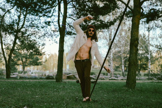 Young man balancing on slackline