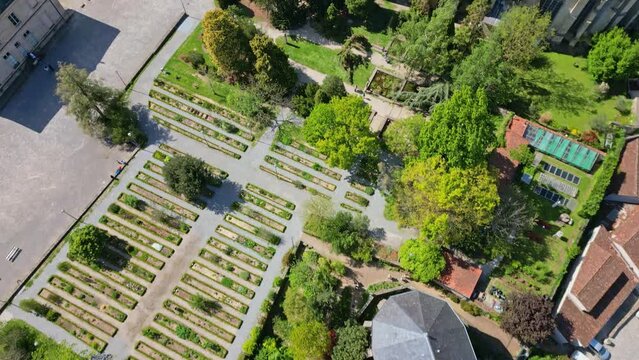 Drone flying over Botanical garden of Bishopric, Limoges in France. Aerial top-down forward
