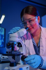 Female scientist working in modern laboratory Doctor doing microbiological research Laboratory...