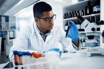 Indian man, blood or scientist in lab for science innovation, life expectancy or antiaging...