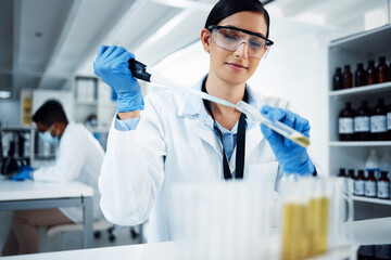 Woman, vial liquid or scientist in lab for medical innovation, life expectancy and antiaging...