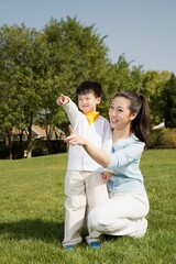 Mother and child on the grass