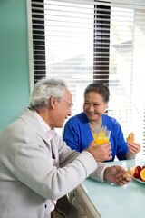 Elderly couples have breakfast in the restaurant
