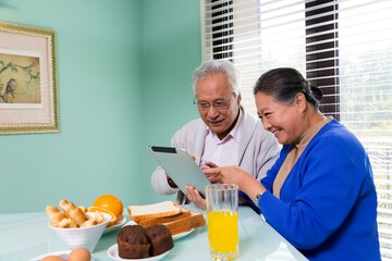 Elderly couples have breakfast in the restaurant