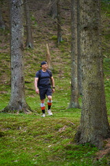 Fototapeta premium Hiker man with backpack in the mountains