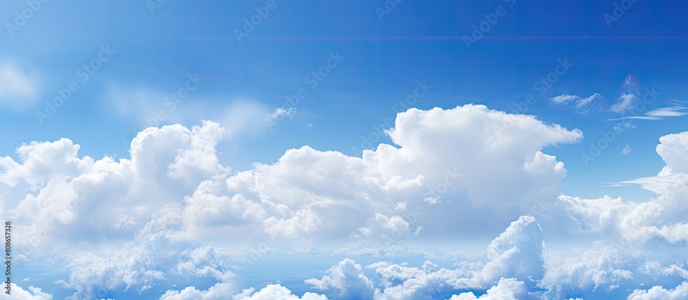 Canvas Prints Copy space image featuring a mesmerizing abstract background of a blue sky adorned with fluffy white clouds