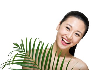 Naklejka premium Shed on young women and green leaves