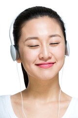 Shed happy young woman wearing headphones