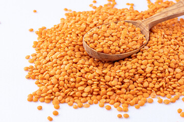 Red lentils pile isolated.Pile lentil isolated on white background.