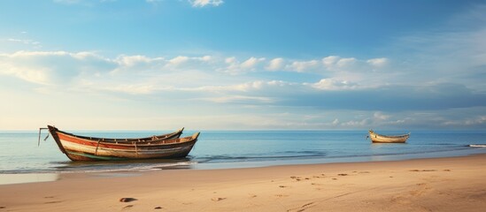Afternoon view of the beach with traditional fishing boats offering a scenic backdrop to capture in a copy space image