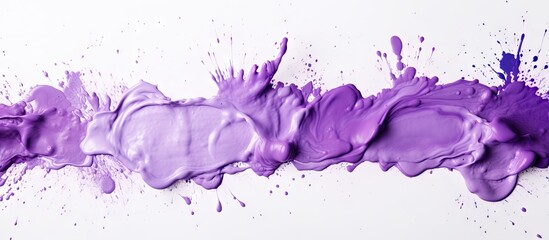 Obraz premium There is a copy space image of purple watercolor paint spilled on a textured white background