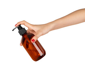 Hand holding plastic tube product on isolated background.