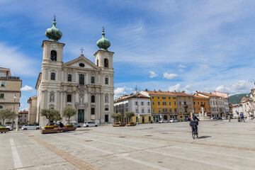 City of Gorizia, Piazza della Vittoria with the Church of Sant'Ignazio and the fountain. The beautiful streets and the castle behind them are a trace of history. Cultural Heritage Capital 2025.