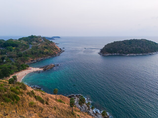 Beautiful view point on weekend. A hill with a beautiful view next to the sea and an evening atmosphere. Suitable for relaxing. Tourist attractions in Asia That foreigners like. Promthep Cape, Puket