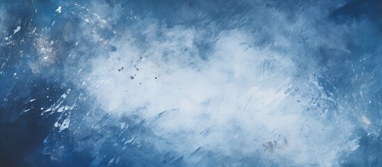 Abstract grunge background with splashes of white paint on a dark blue background providing ample copy space for an image