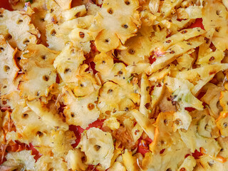 Cut out pineapple skin background. Pineapple peel texture. Peeled pineapple. Pineapple skin trash.