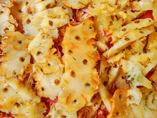 Cut out pineapple skin background. Pineapple peel texture. Peeled pineapple. Pineapple skin trash.