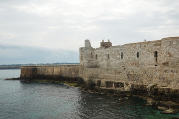 Fototapeta na wymiar The Castle Maniace and old town of Syracuse, Sicily, Italy