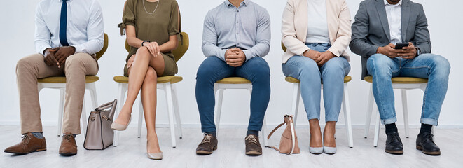 Job interview, waiting and candidates with legs of people on chairs for recruitment, business or...