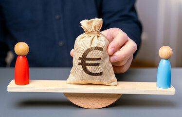 Legal dispute over money. A court case. Plaintiff and defendant on scales and a bag with euro...