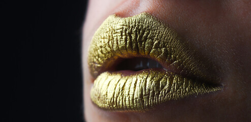 Lip icon with golden glitter effect. Sensual mouth. Symbol of kiss from golden lipstick. Glamour...