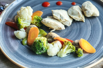 Plate of Food With Broccoli, Cauliflower, and Carrots