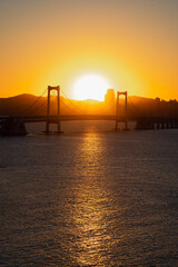Obraz premium Xinghai Bay Bridge at sunset